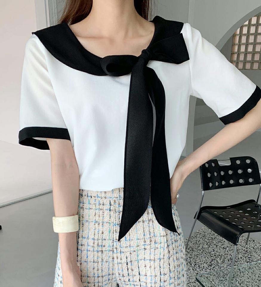 配色リボンブラウス・b72754 レディース 【bl】ブラウス トップス 配色 柄 模様 りぼん リボン モノトーン 半袖 デコルテ バイカラー 春 夏 モノトーン 上品 高級感 学校行事 きれいめ フェミニン 白 黒 ブラック 韓国ファッション ハイホリHIHOLLI