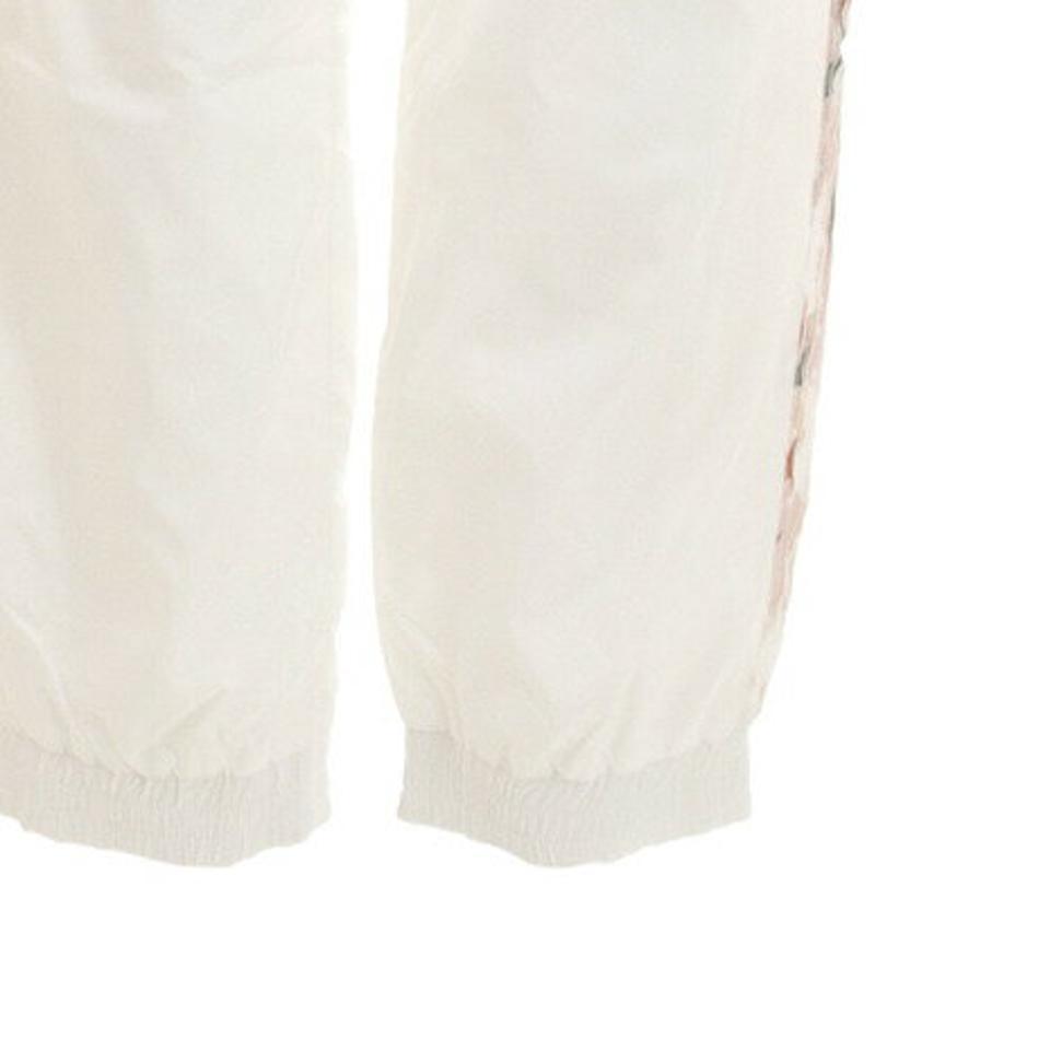 ルコック スポルティフ(Lecoq Sportif)(レディース)ウィンドロングパンツ QMWOJG20MA WHT スポーツウェア オンライン価格