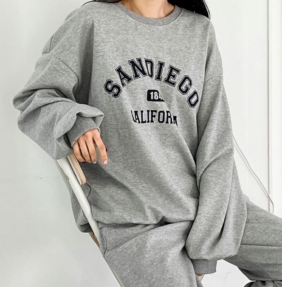 SANDIEGOスウェット&ジョガーパンツSET・p002020 レディース 【pt】セットアップ セット setup トップス スウェット トレーナー 長袖 柄 模様 ロゴ ロゴT パンツ ロング丈 ジョガーパンツ 秋 冬 カジュアル ラフ 韓国ファッション MKT