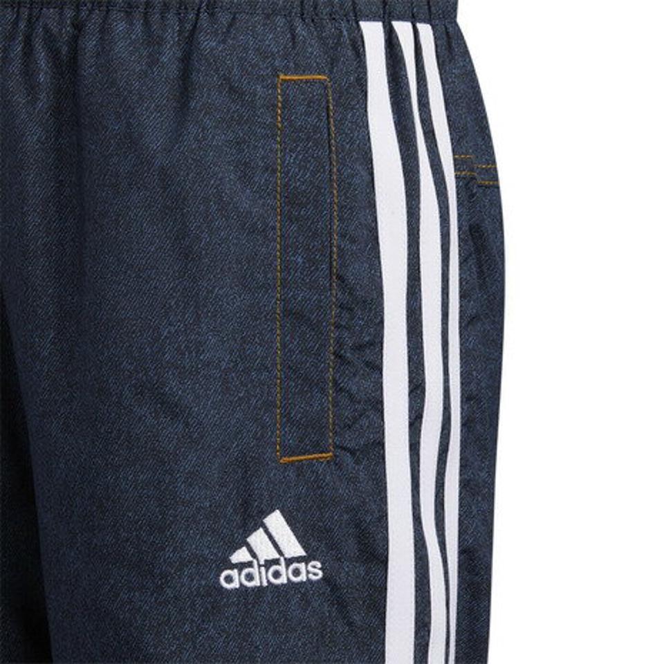 【10%OFFクーポン対象!7/5まで】アディダス(adidas)(キッズ)キッズ デニム 総柄プリント ルーズフィット ウーブントラックパンツ BUK57-IB0255