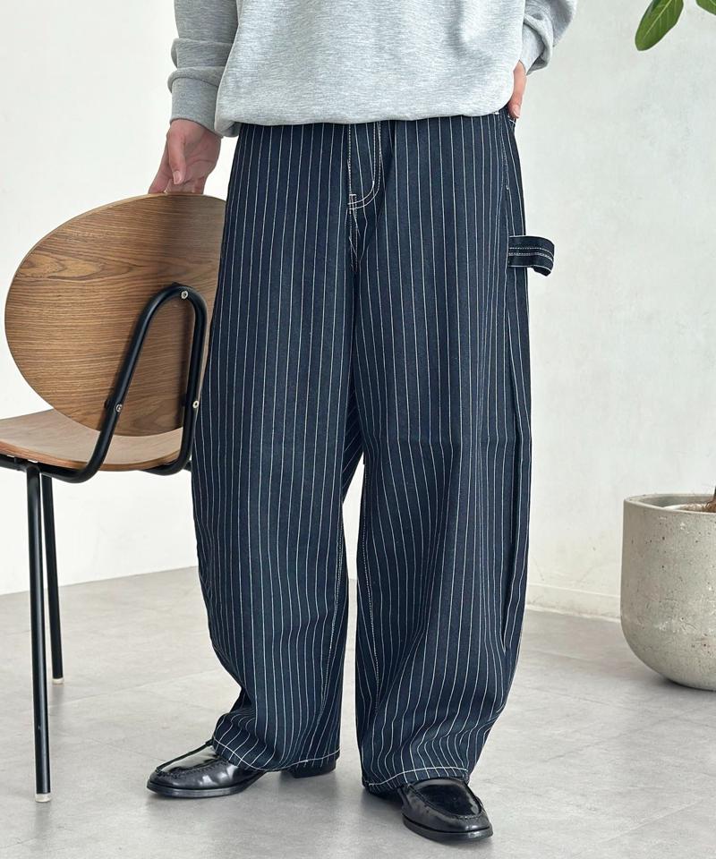 カーブペインターデニムパンツ