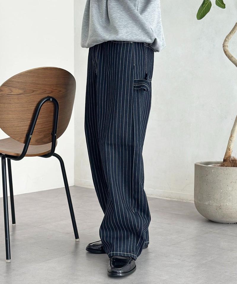 カーブペインターデニムパンツ