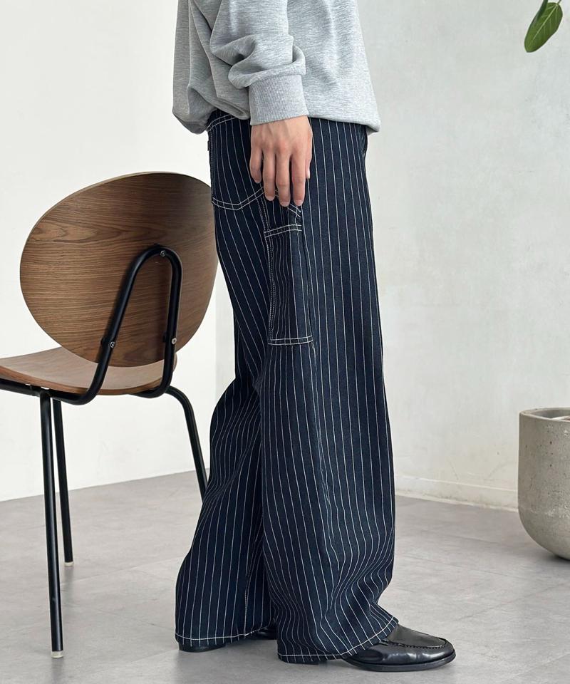 カーブペインターデニムパンツ