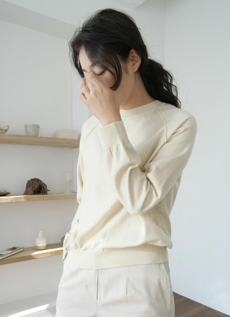 ラグランニットトップス