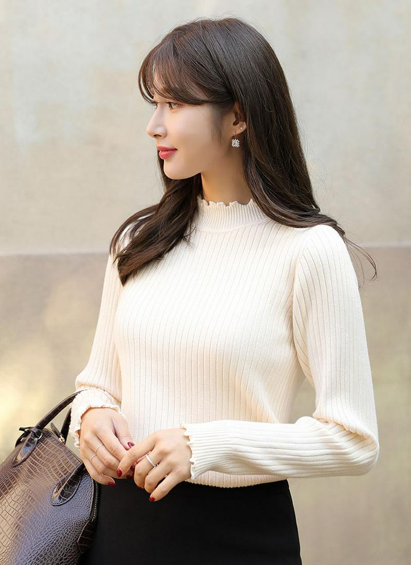 ウェーブヘムリブニット