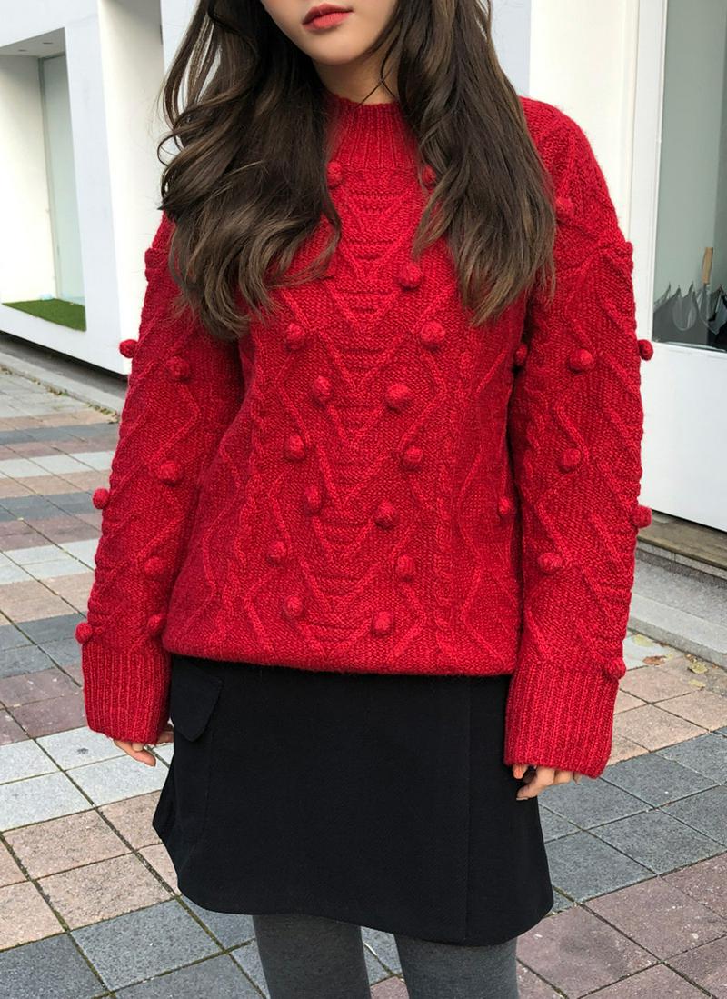 ポンポンパターンニット