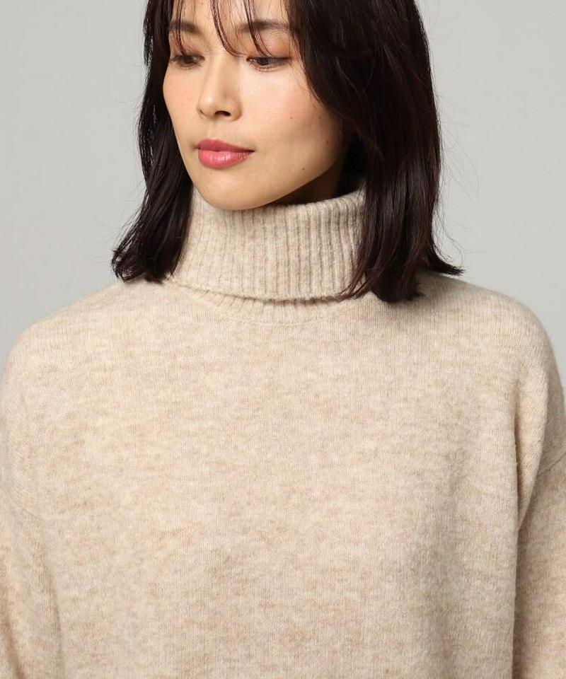 メランジウールタートルニット