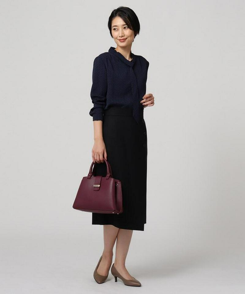 グラフィカルブリックプリントボウタイブラウス