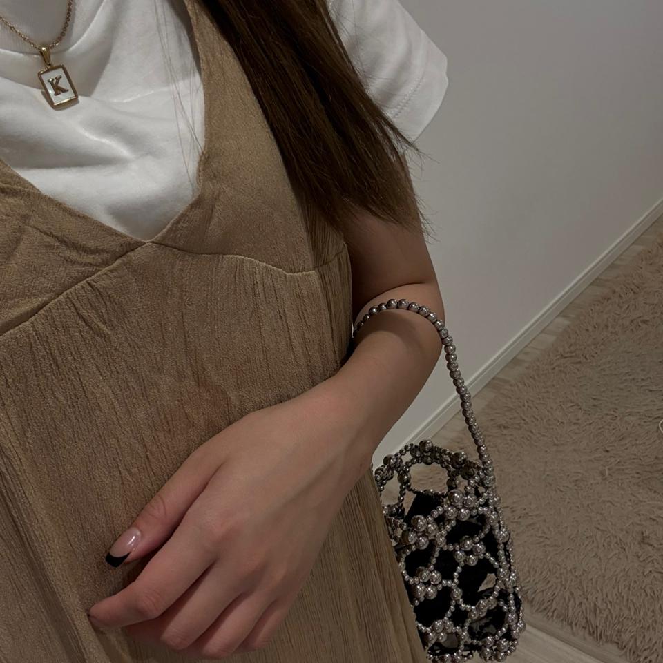 {{.FirstItem.Brand.Name}}({{.FirstItem.Brand.NameKana}})の「{{.FirstItem.Name}}」を使った{{.PostType}}